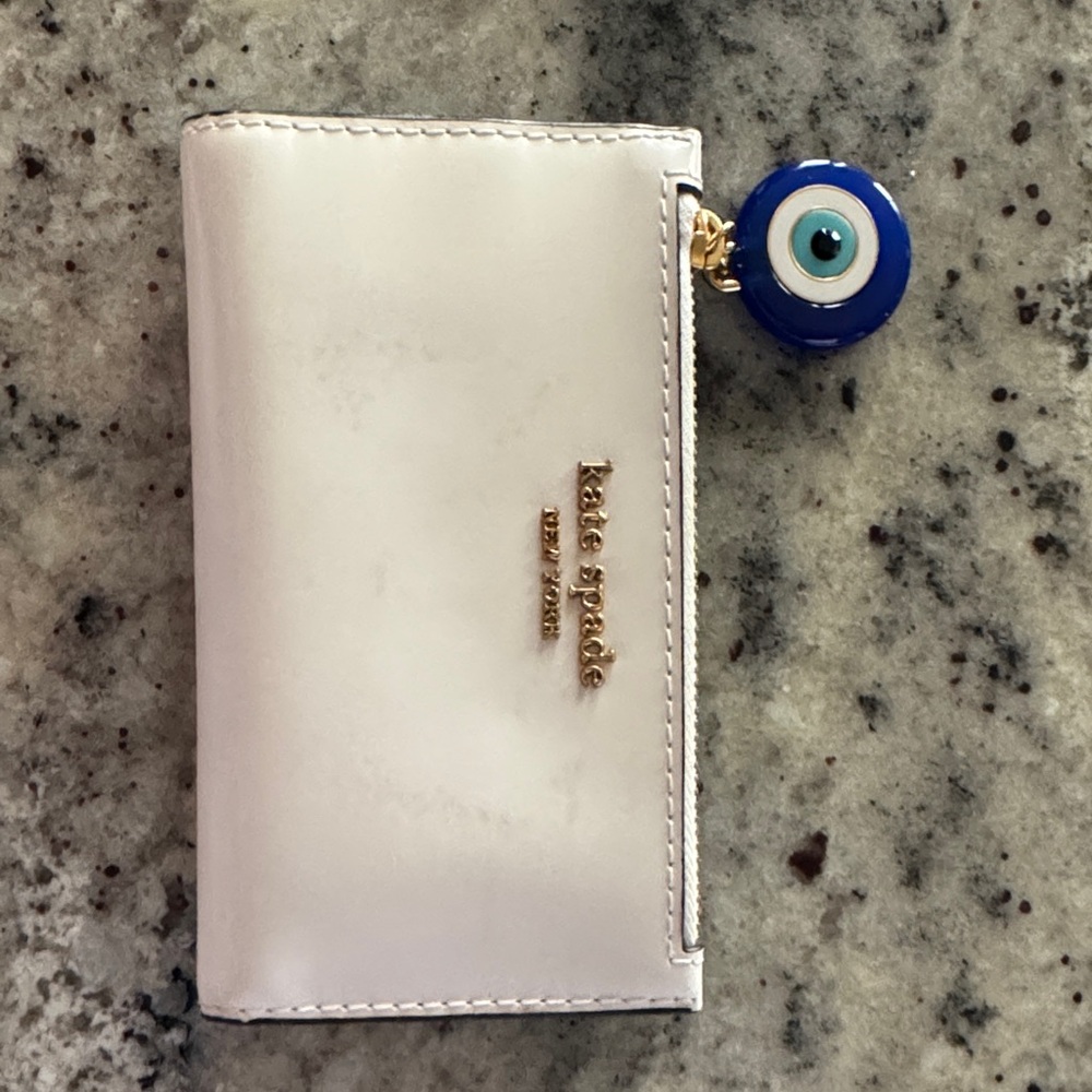 Kate Spade Cream Wallet with Blue Eye Charm